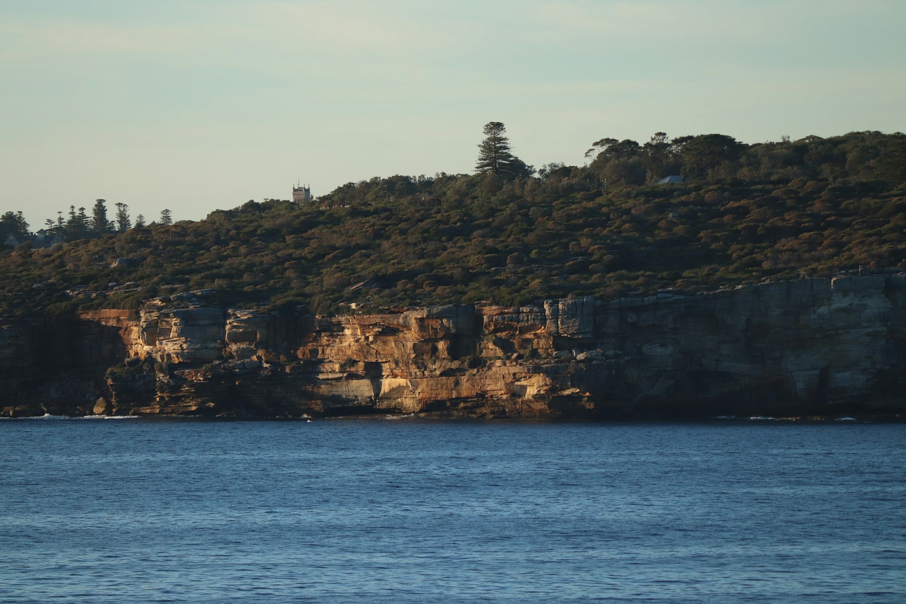 Coastal cliffs and calm water at Watsons Bay